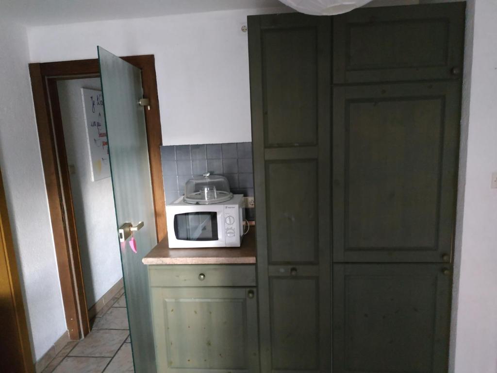 Kuchyň nebo kuchyňský kout v ubytování Chez Chris & Ju