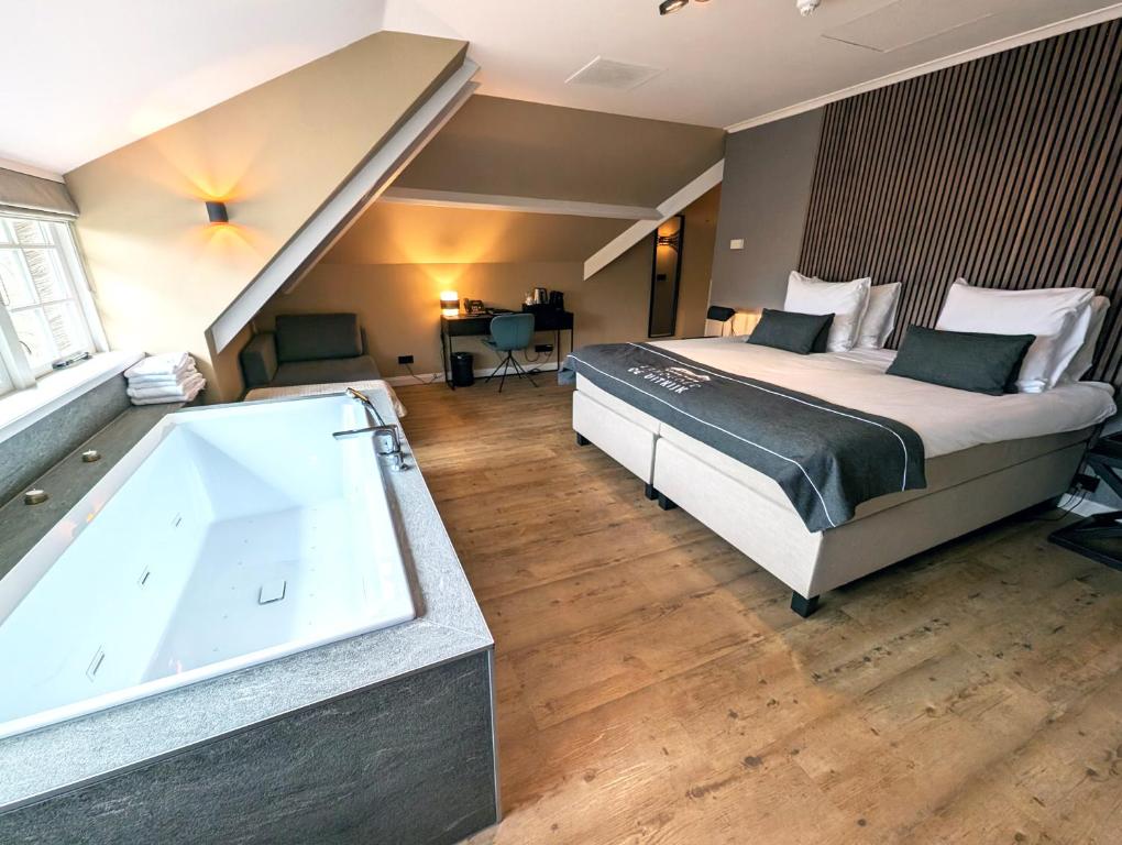 Een bed of bedden in een kamer bij Landgoed De Uitkijk Hellendoorn