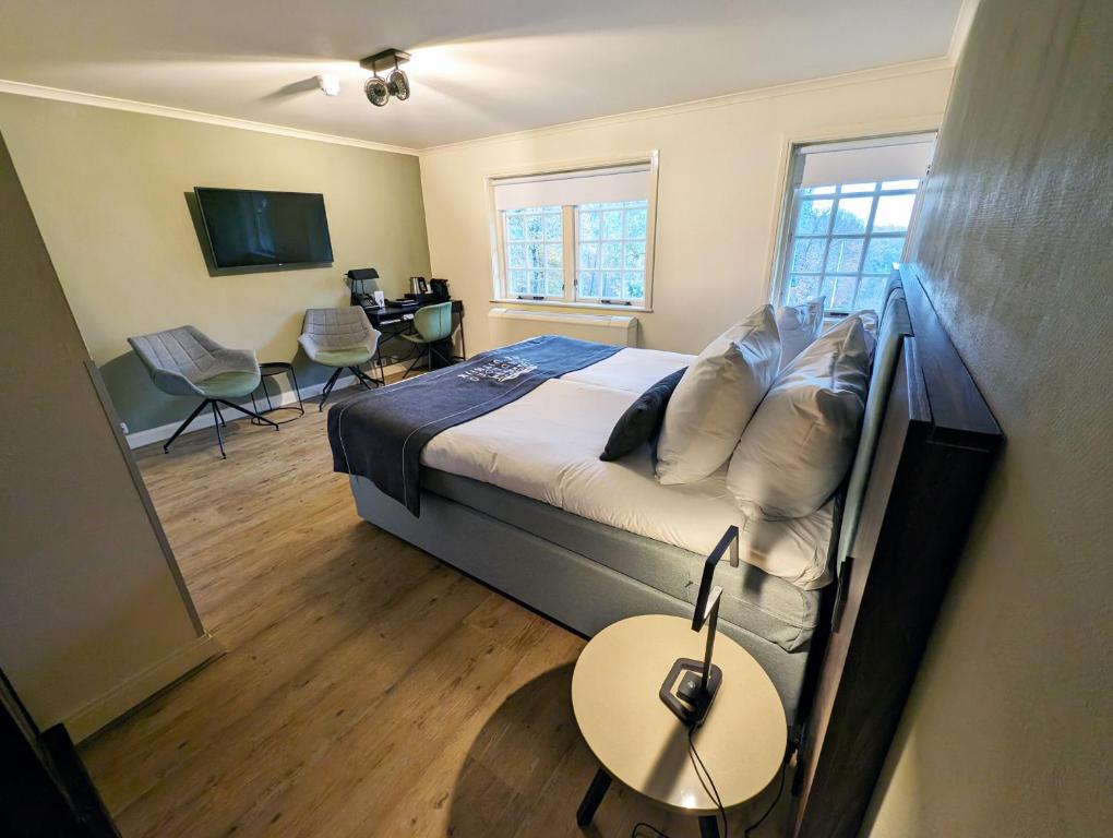 Een bed of bedden in een kamer bij Landgoed De Uitkijk Hellendoorn