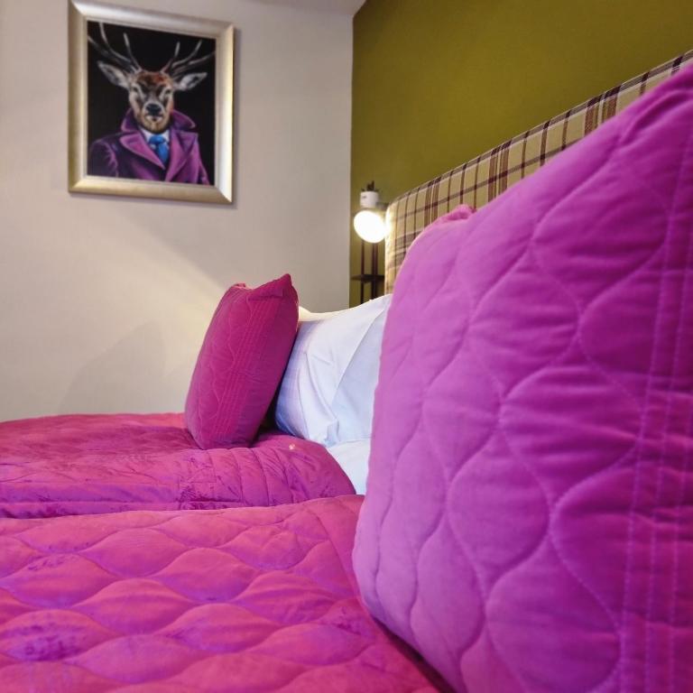 Postel nebo postele na pokoji v ubytování Rose Villa