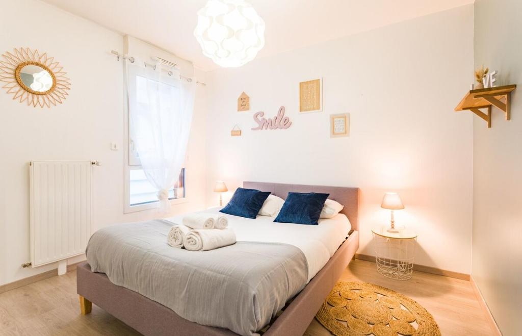 Le Bacchus parking 1 chambre moderne -Tout confort tesisinde bir odada yatak veya yataklar