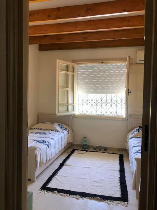 Postel nebo postele na pokoji v ubytování Dar al Murad : Une maison, un coin de paradis