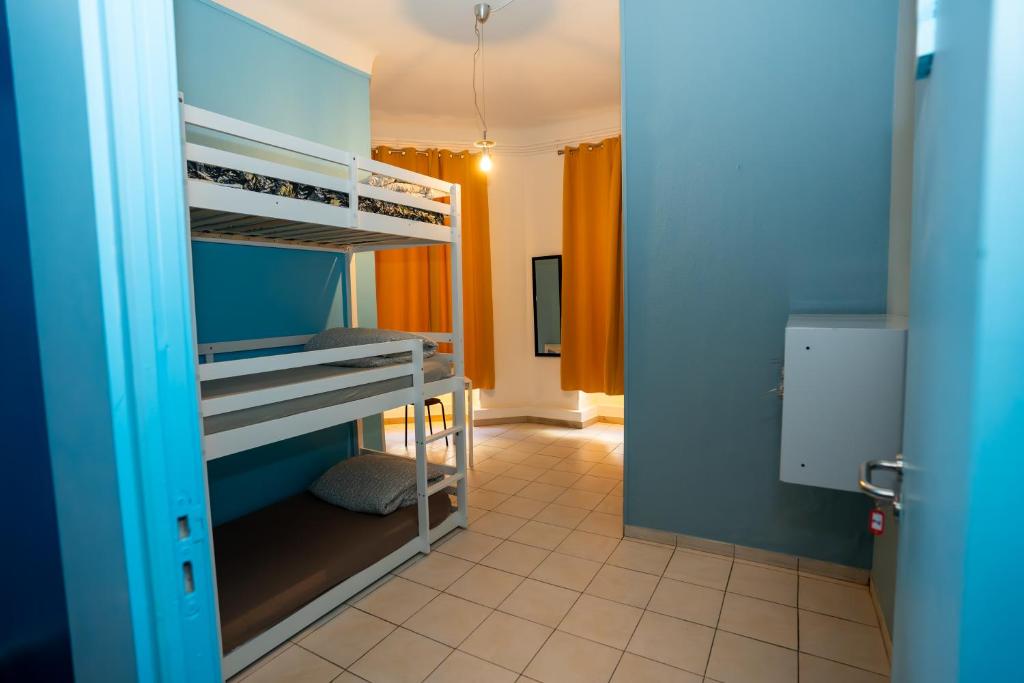 Postel nebo postele na pokoji v ubytování Le Pastoral