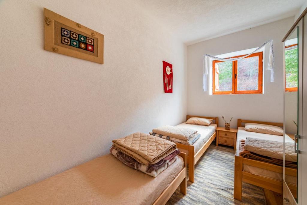 Postel nebo postele na pokoji v ubytování Hostel Mojan