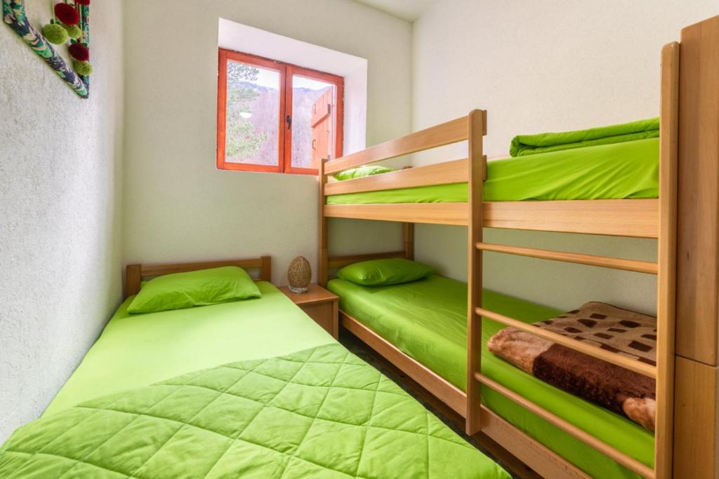 Postel nebo postele na pokoji v ubytování Hostel Mojan