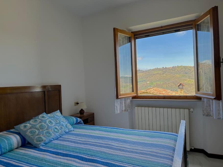 Posteľ alebo postele v izbe v ubytovaní Tuscany Panoramic View - Relax in Val D'Orcia