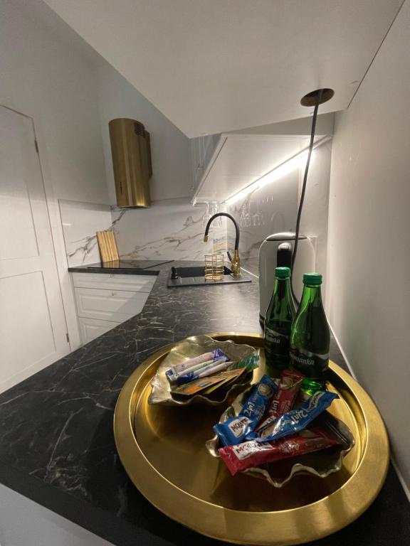 Kuchyňa alebo kuchynka v ubytovaní Apartament z jacuzzi - Centrum Szczytna Mazury