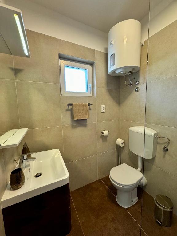 Ein Badezimmer in der Unterkunft Apartman Sunce