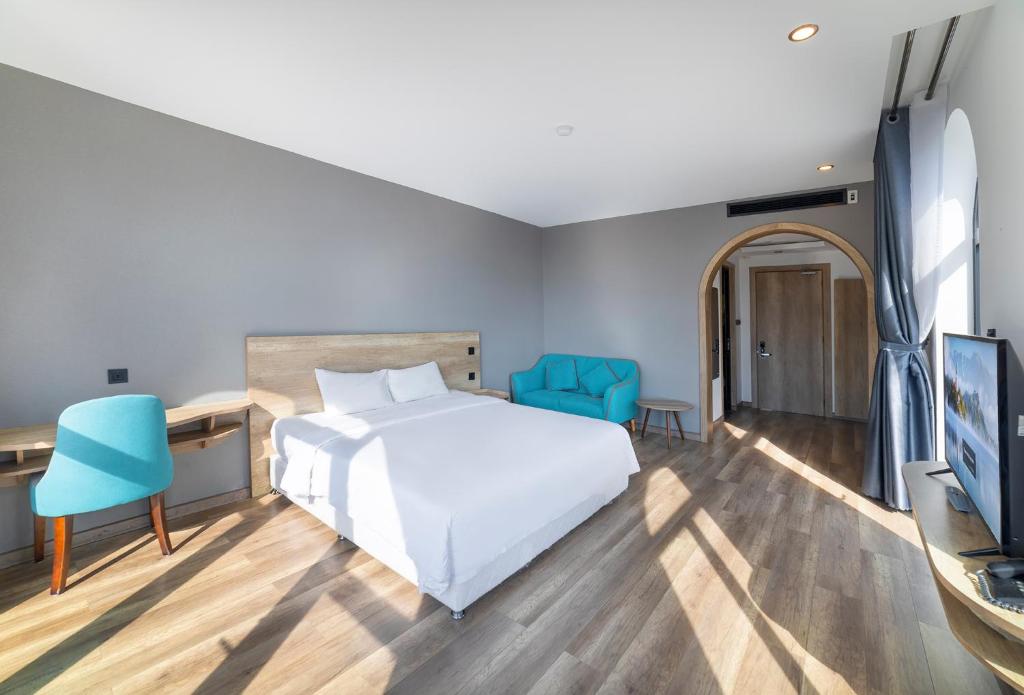 Postel nebo postele na pokoji v ubytování Hafi Beach Hotel