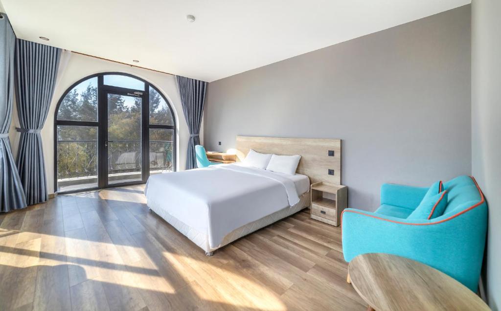 Postel nebo postele na pokoji v ubytování Hafi Beach Hotel