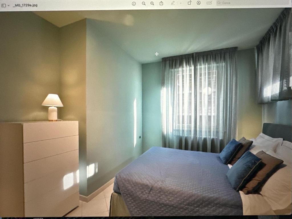 A bed or beds in a room at Comosole