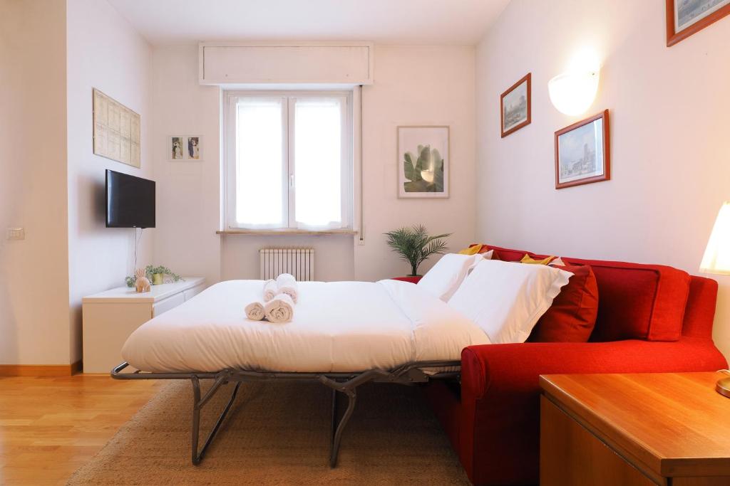 Postel nebo postele na pokoji v ubytování PrimoPiano - Buccinasco