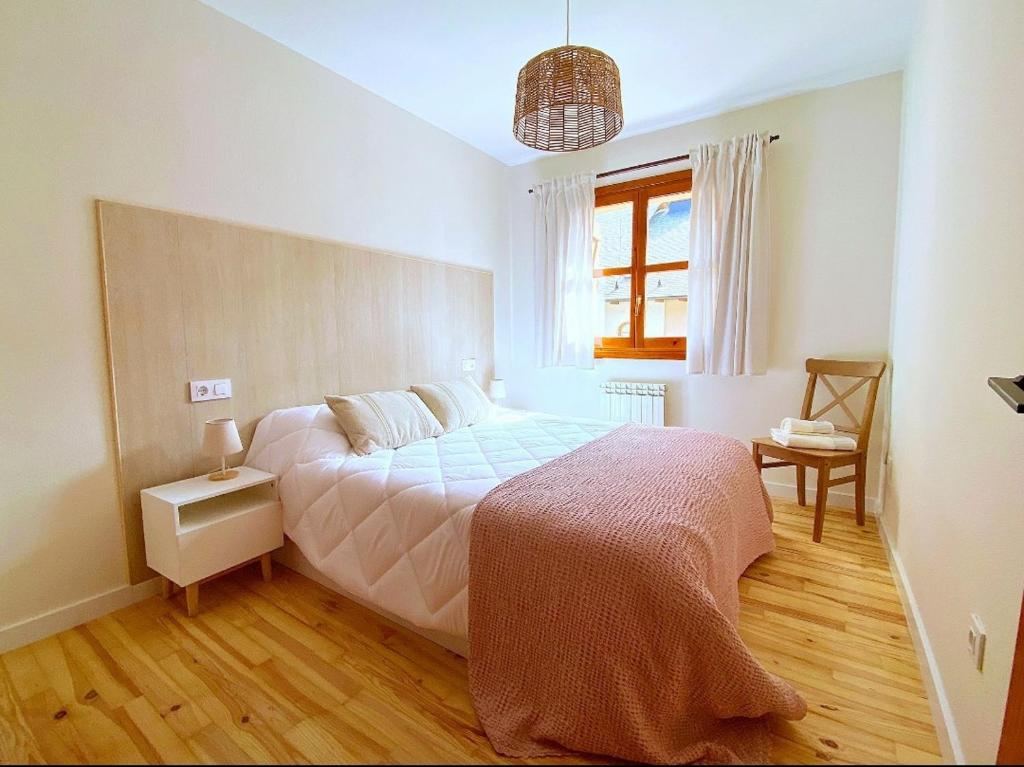 Un pat sau paturi într-o cameră la CHECK-IN CASAS Ixarso