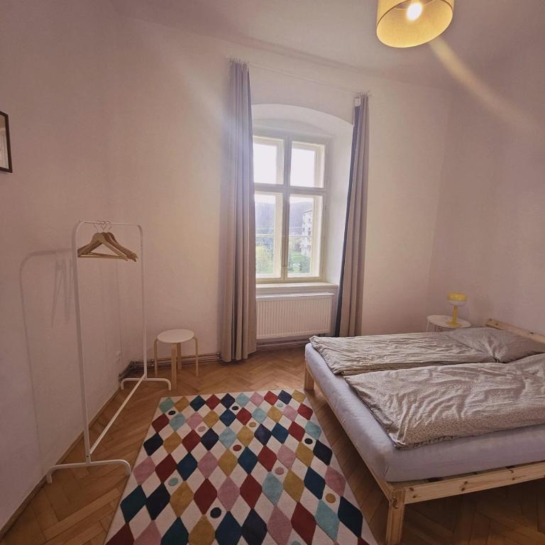 Łóżko lub łóżka w pokoju w obiekcie Zámek Ruda nad Moravou