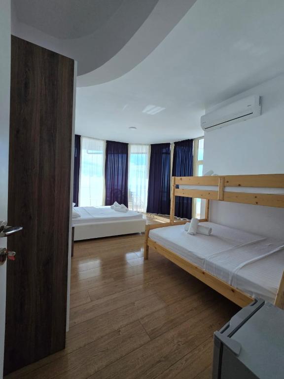 Postel nebo postele na pokoji v ubytování BLUE AMR