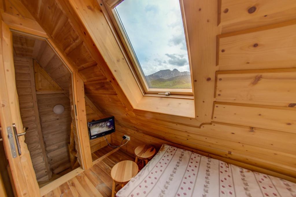 Posteľ alebo postele v izbe v ubytovaní Domki Tatra Lux Zakopane