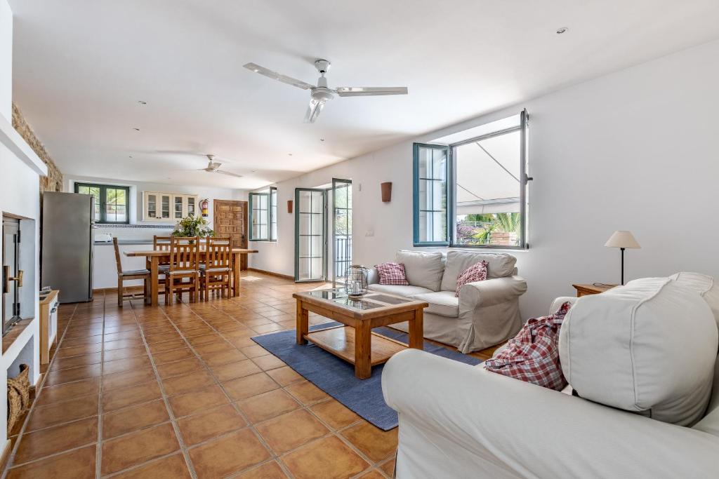 a living room with a couch and a table at Padre Aviles in Olías