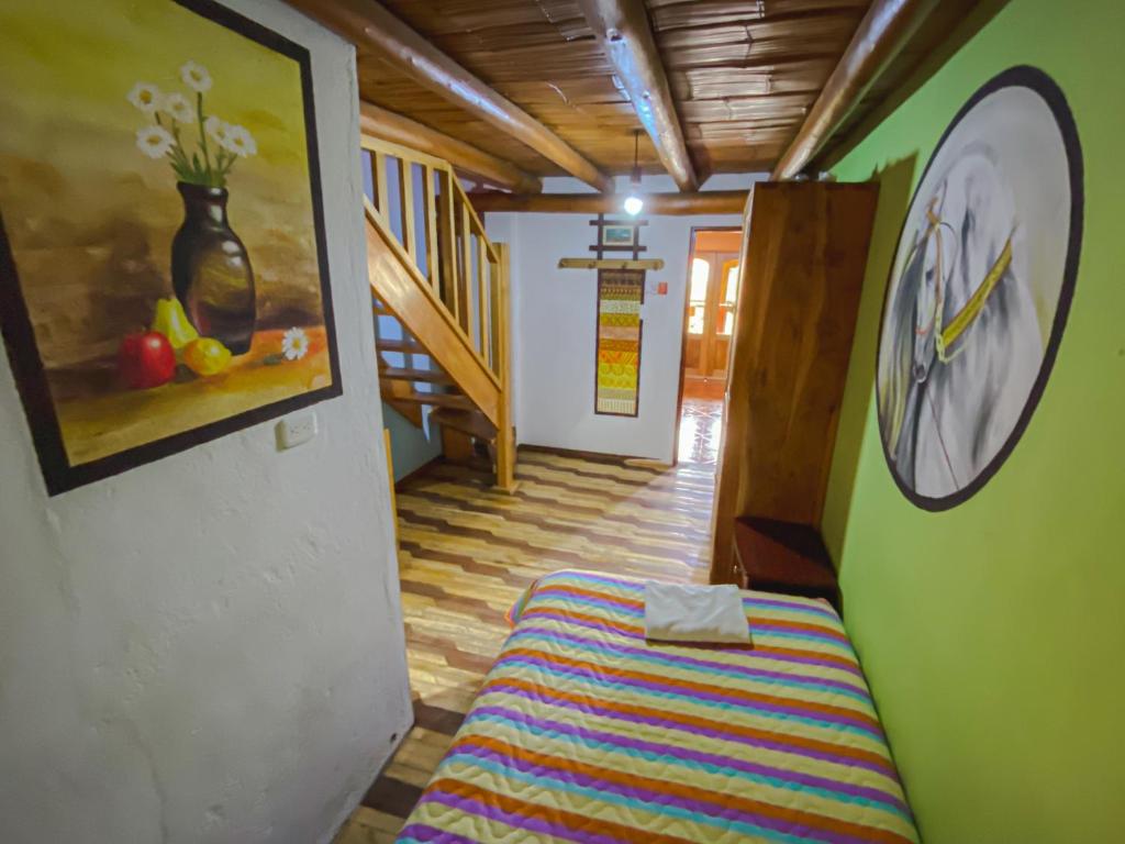 Postel nebo postele na pokoji v ubytování Hostería Chukirawa