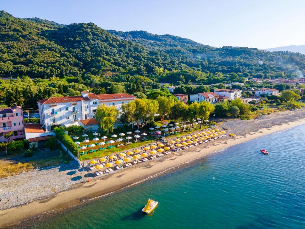 an aerial view of a beach with a resort at Hotel Eden Park Cilento in Policastro Bussentino