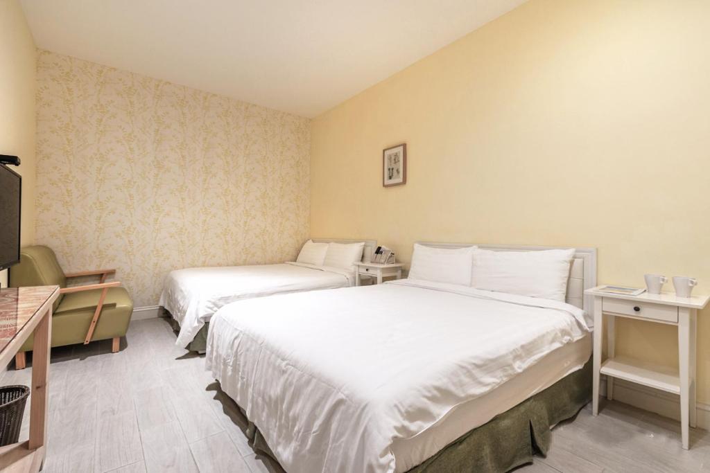 Postel nebo postele na pokoji v ubytování Sommer 19 B&B