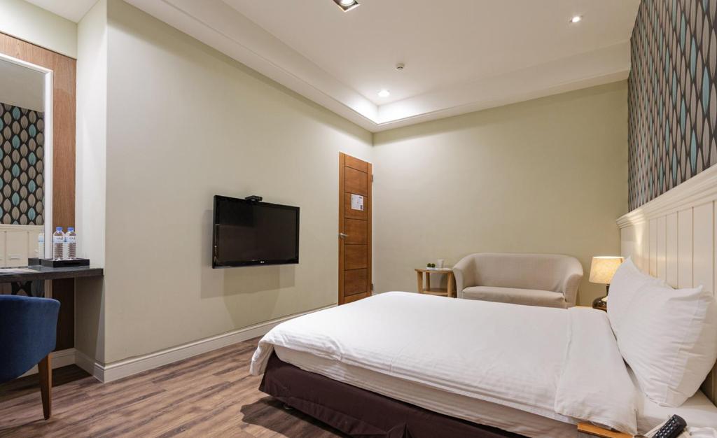 TV a/nebo společenská místnost v ubytování Sommer 19 B&B