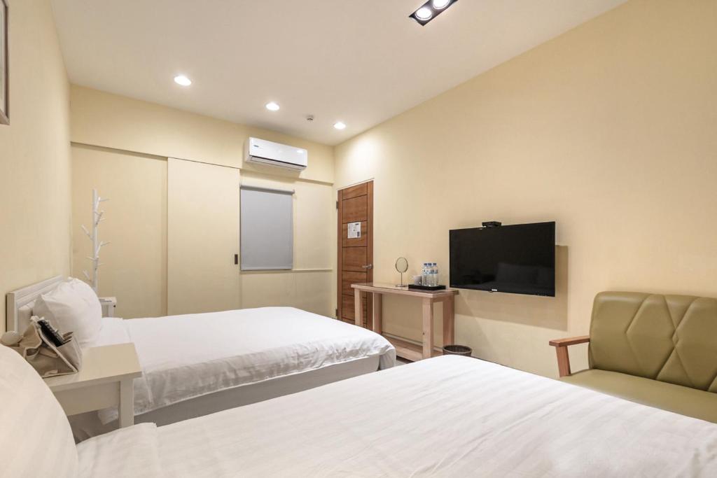 TV a/nebo společenská místnost v ubytování Sommer 19 B&B