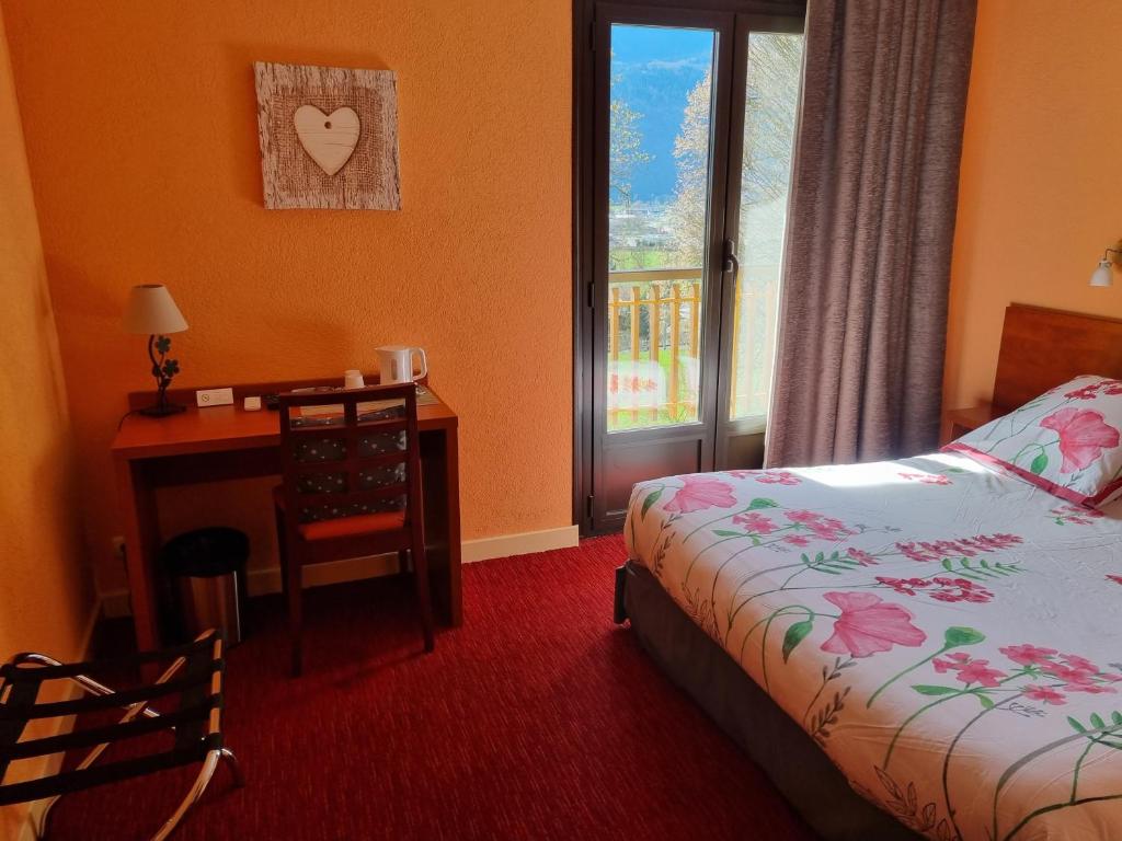 Postel nebo postele na pokoji v ubytování Hotel Bellevue