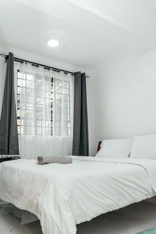 Postel nebo postele na pokoji v ubytování Juston Homes AirBNB kisii