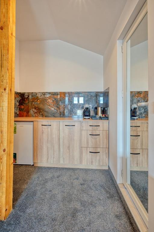Kuchyň nebo kuchyňský kout v ubytování Sakutski House