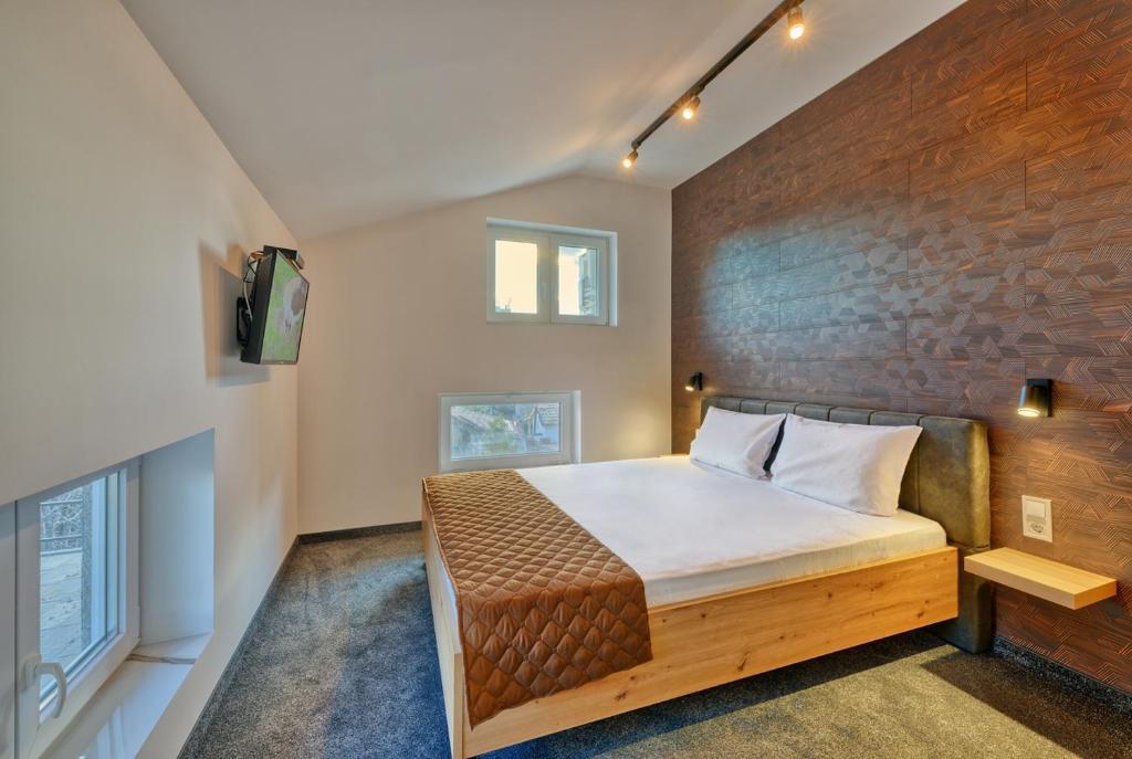 Postel nebo postele na pokoji v ubytování Sakutski House