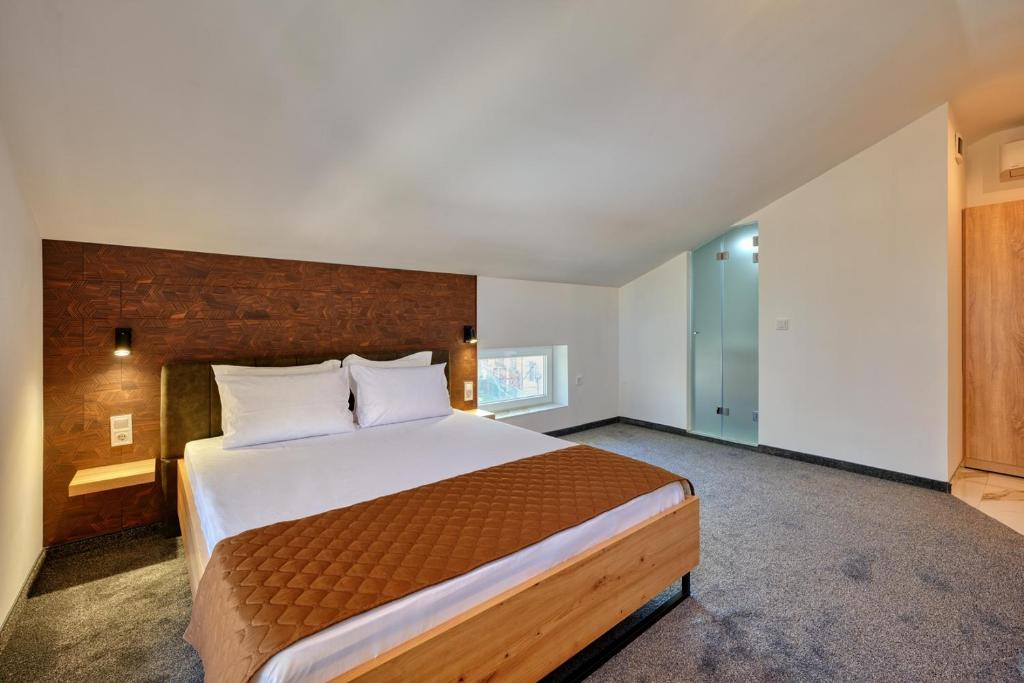 Postel nebo postele na pokoji v ubytování Sakutski House