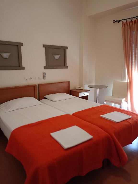Postel nebo postele na pokoji v ubytování Efstratios Hotel