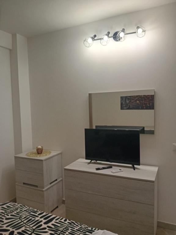 TV a/nebo společenská místnost v ubytování HOUSE MAGIE 2 e 3