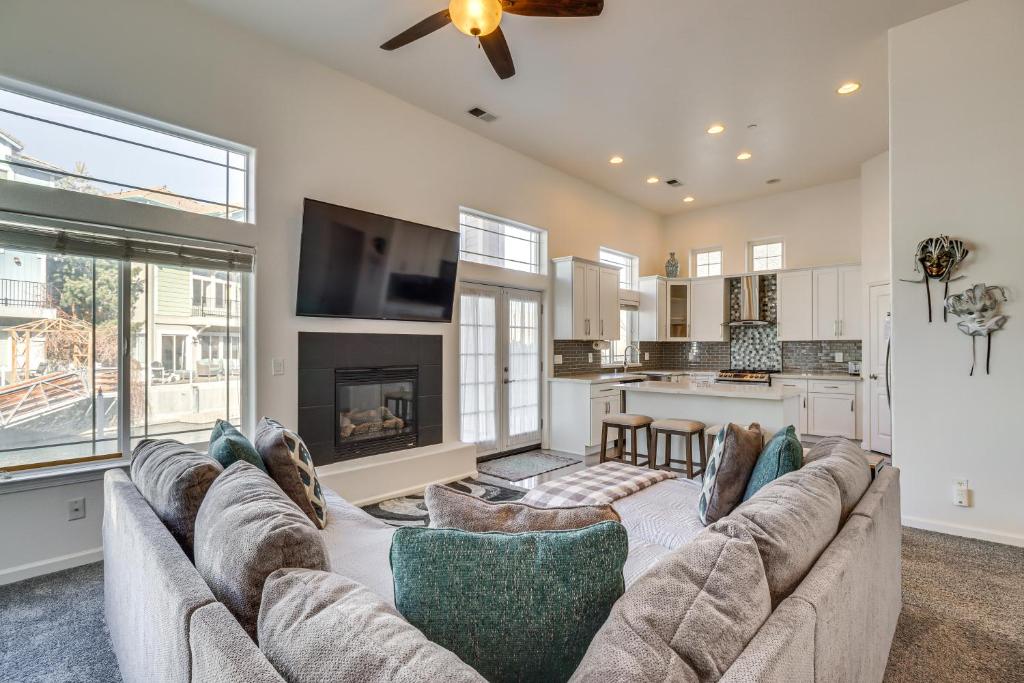a living room with a couch and a fireplace at 5 Mi to Downtown Reno Home with Lake Access! in Sparks