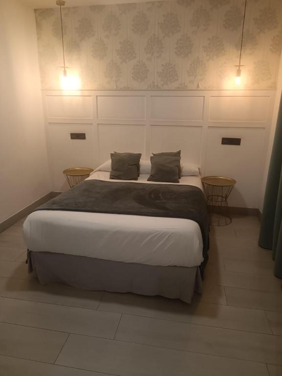 Postel nebo postele na pokoji v ubytování Hotel Cedran