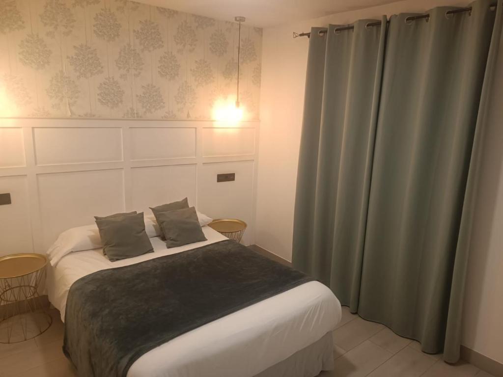 Postel nebo postele na pokoji v ubytování Hotel Cedran