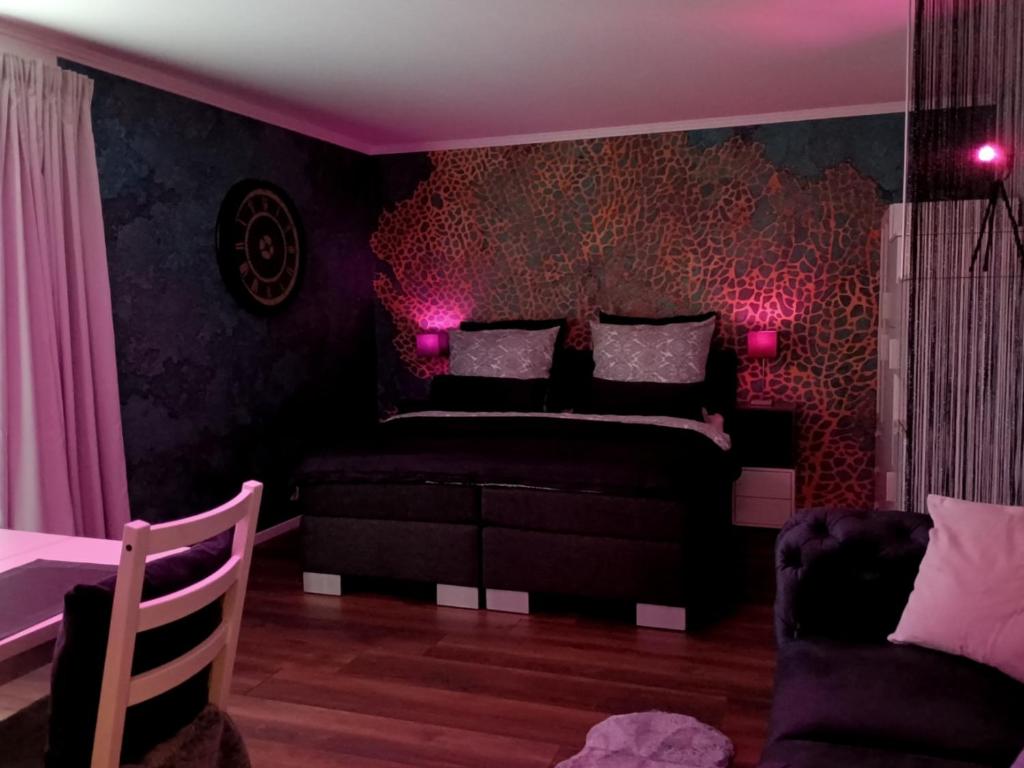 Postel nebo postele na pokoji v ubytování Zeitlos in Waldkirchen