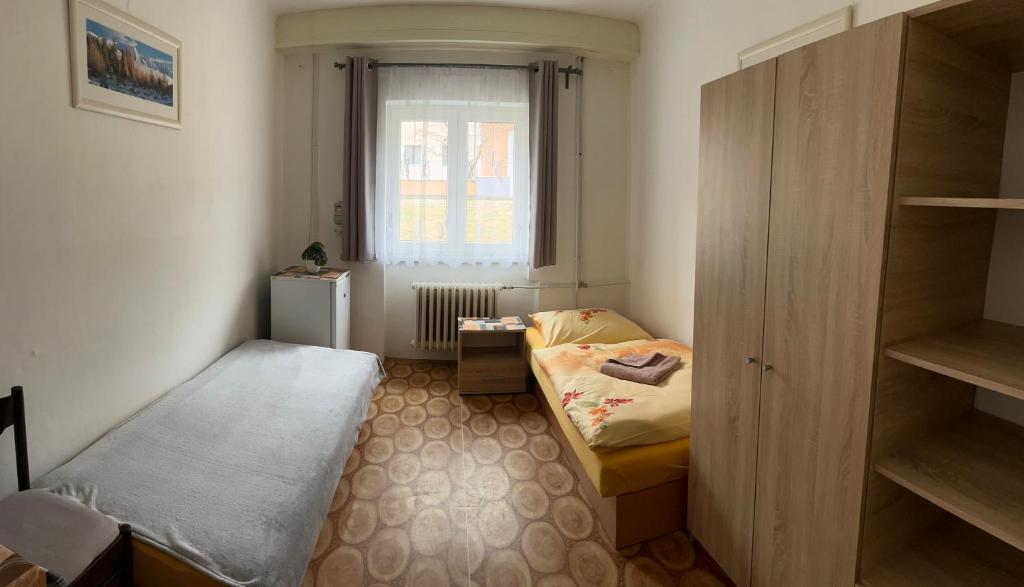 Postel nebo postele na pokoji v ubytování Ubytování U Ropáků