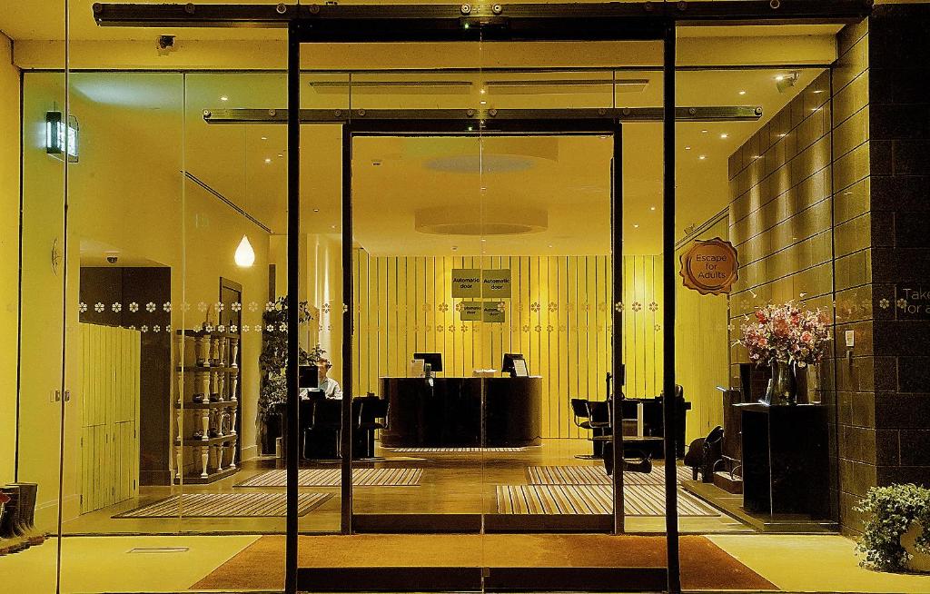 a lobby with a glass door in a building at Lifehouse Spa And Hotel in Frinton-on-Sea