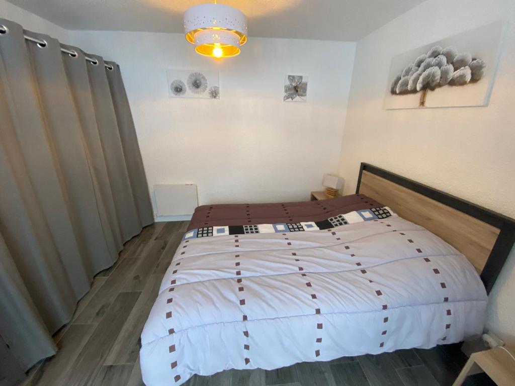 Posteľ alebo postele v izbe v ubytovaní Bel appartement à Châtel, proche centre et remontées mécaniques, avec balcon et parking - FR-1-693-3