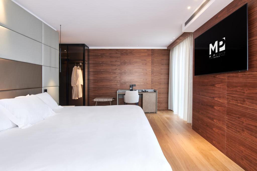 Postel nebo postele na pokoji v ubytování Hotel MyPalace León