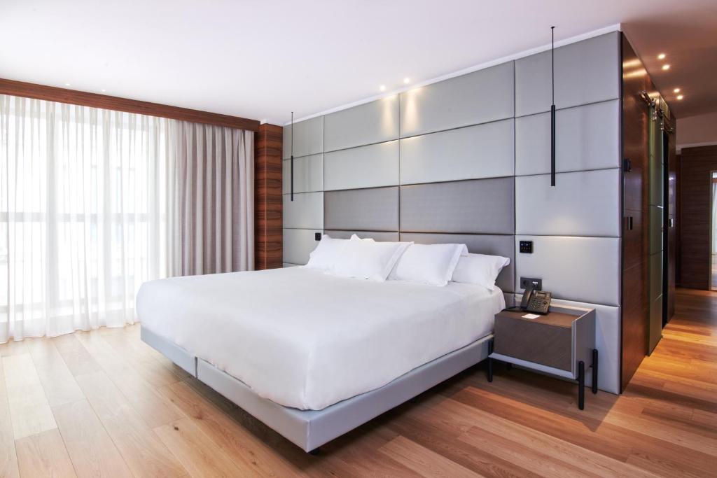 Postel nebo postele na pokoji v ubytování Hotel MyPalace León