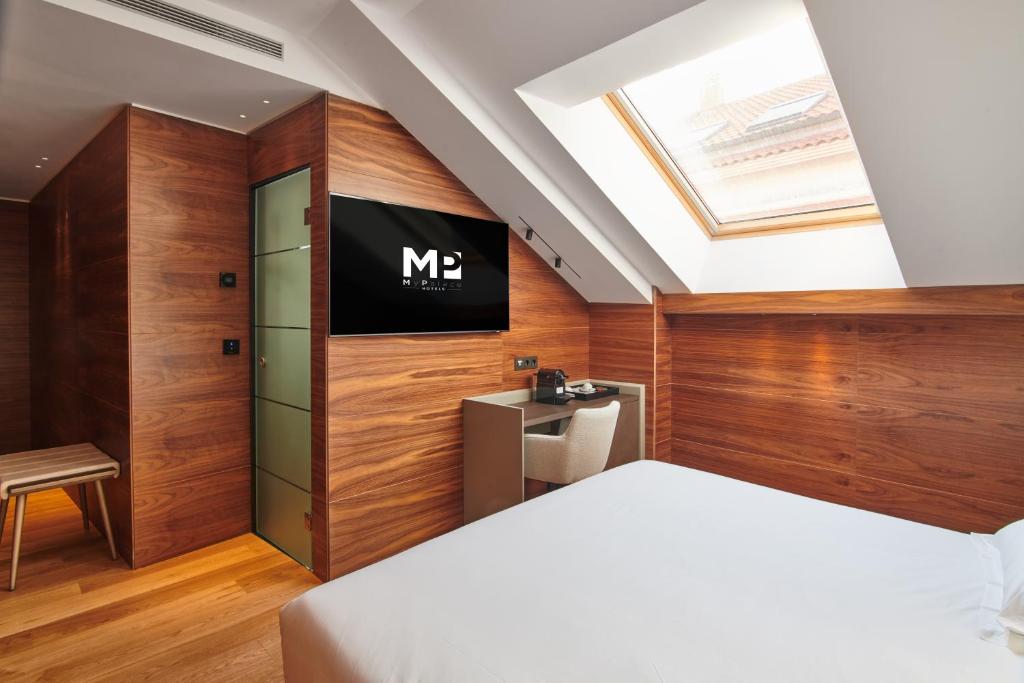 Postel nebo postele na pokoji v ubytování Hotel MyPalace León