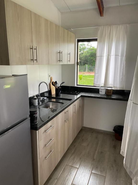 Kuchyň nebo kuchyňský kout v ubytování Residencia Piri 1
