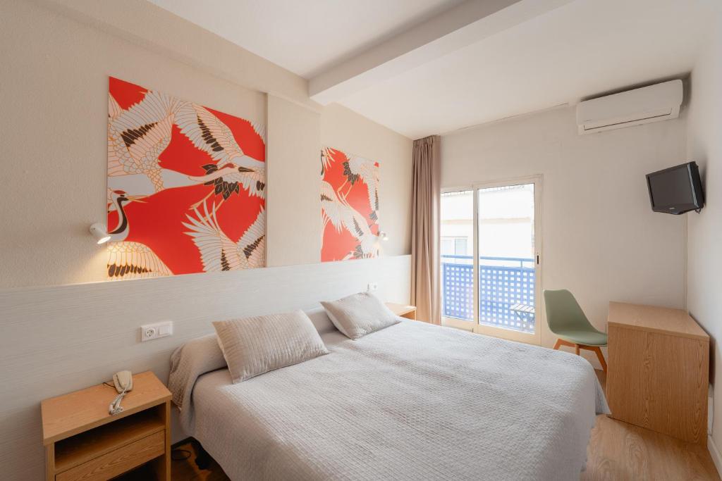 Postel nebo postele na pokoji v ubytování Hotel Internacional
