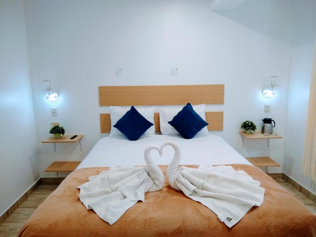 Postel nebo postele na pokoji v ubytování Emmanuel inn Machupicchu