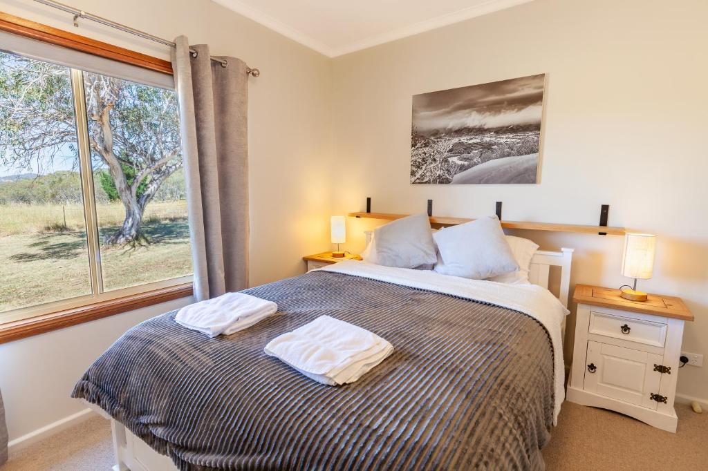 Postel nebo postele na pokoji v ubytování Lazy K - Hideaway