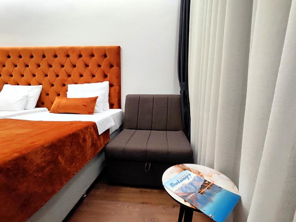Postel nebo postele na pokoji v ubytování Lolo Luxury rooms & suites