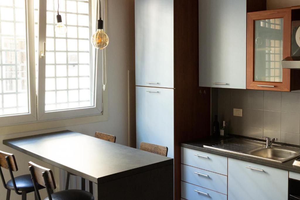 a kitchen with a sink and a counter top at Verona Nest in Verona