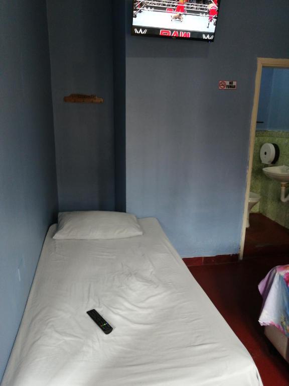 Postel nebo postele na pokoji v ubytování Hotel 24/7